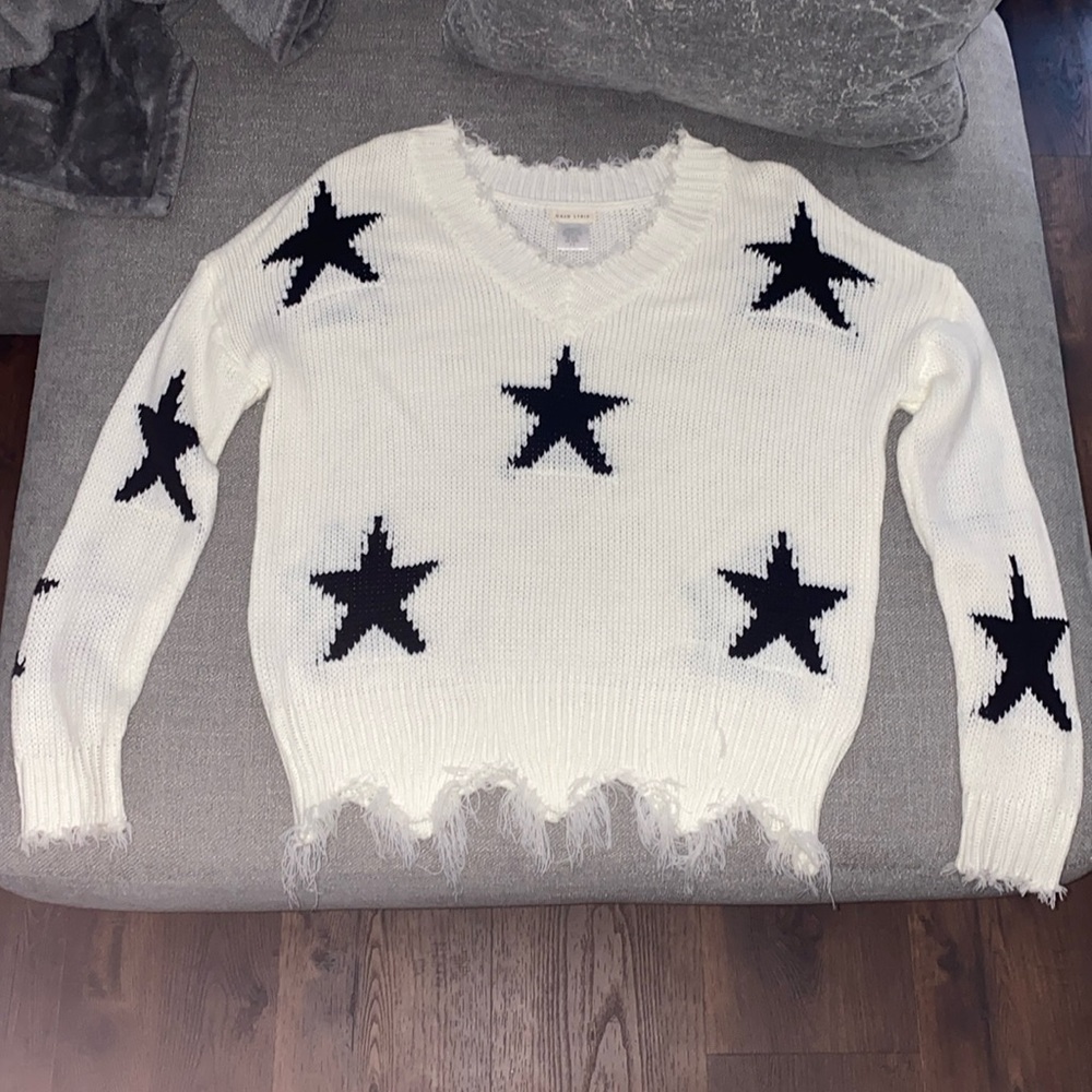 Main Strip white and black star sweater size medium
